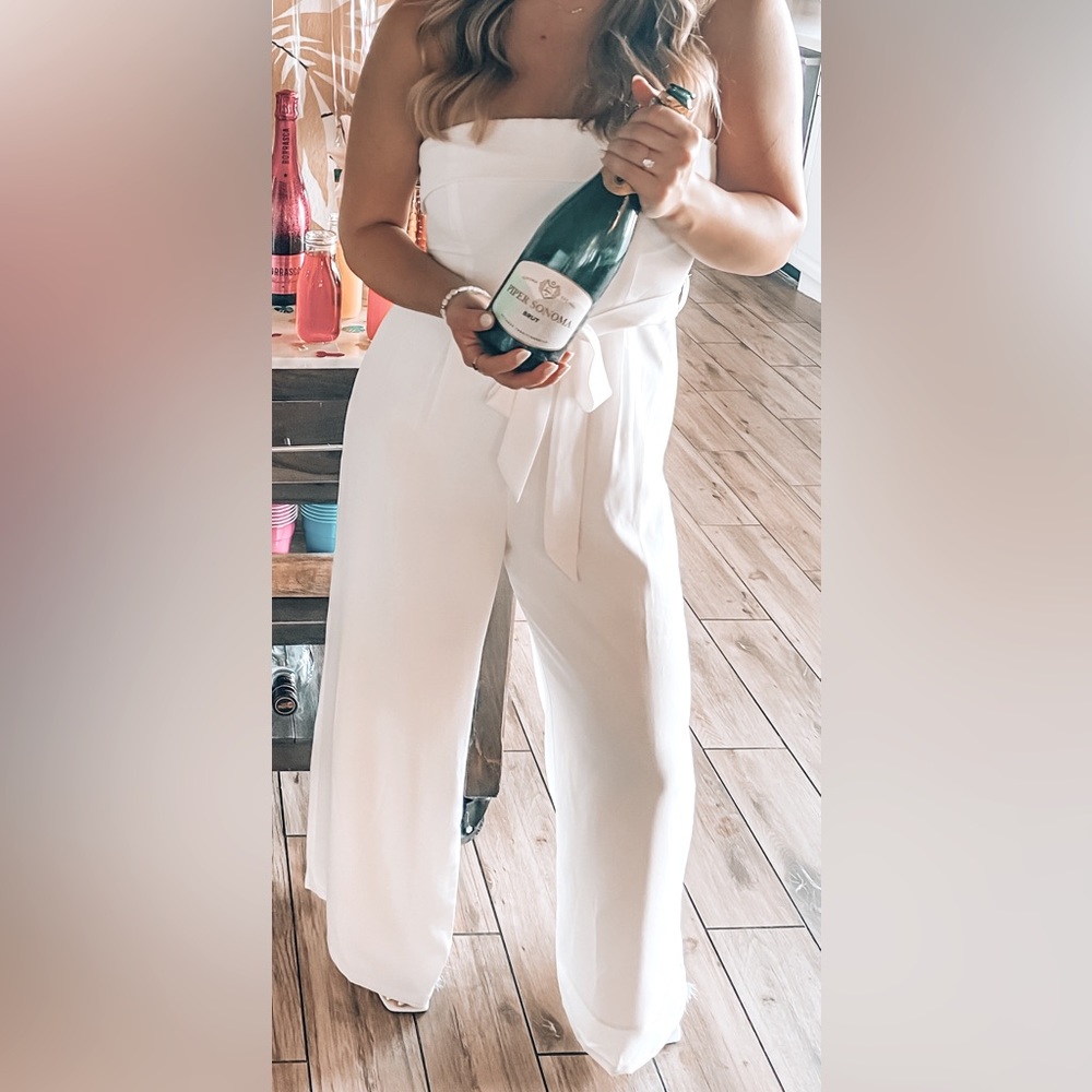 Strapless white jumpsuit, perfect for brides to be!